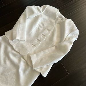LeSuit, white with textured embossed flower pattern. Worn one time.
